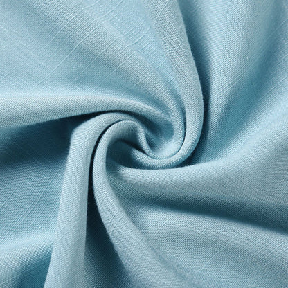 Close-up of light blue fabric with a subtle texture