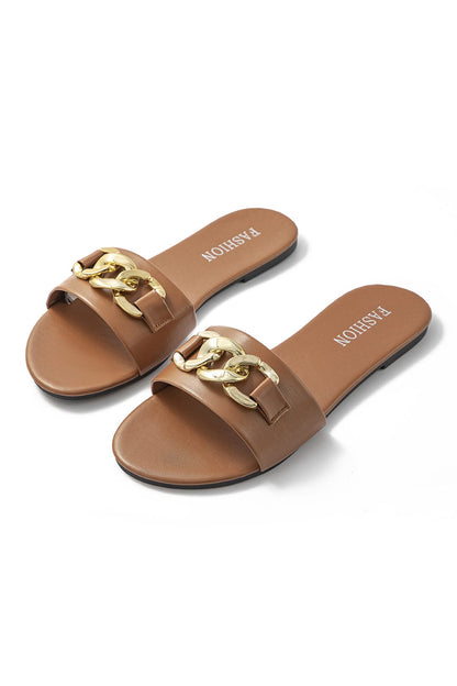 Brown sandals with gold chain detail on a white background