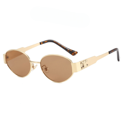 Gold-framed sunglasses with brown lenses on a white background