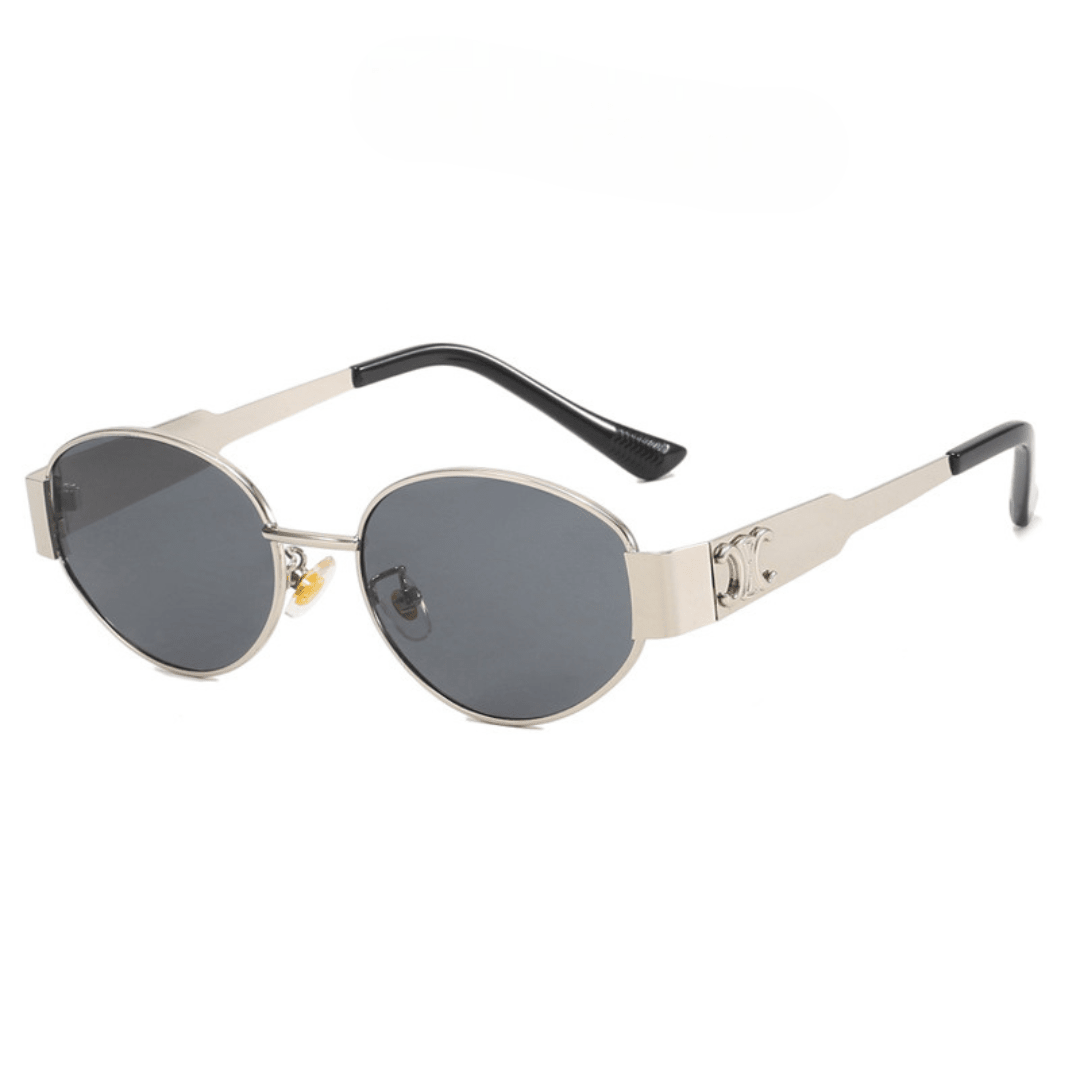 Sunglasses with metallic frame and dark lenses on a white background