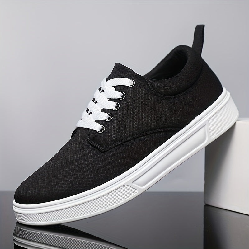 Black sneaker with white sole on a gray background
