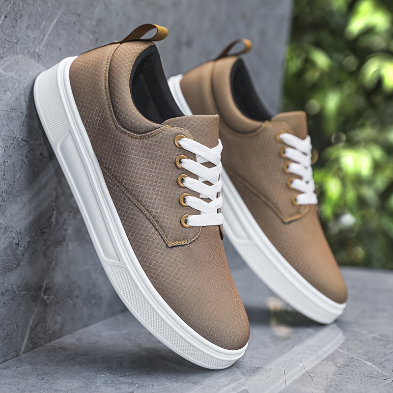 Brown sneakers with white soles leaning against a gray wall.