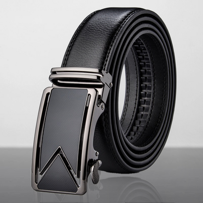 Black leather belt with a silver buckle on a reflective surface