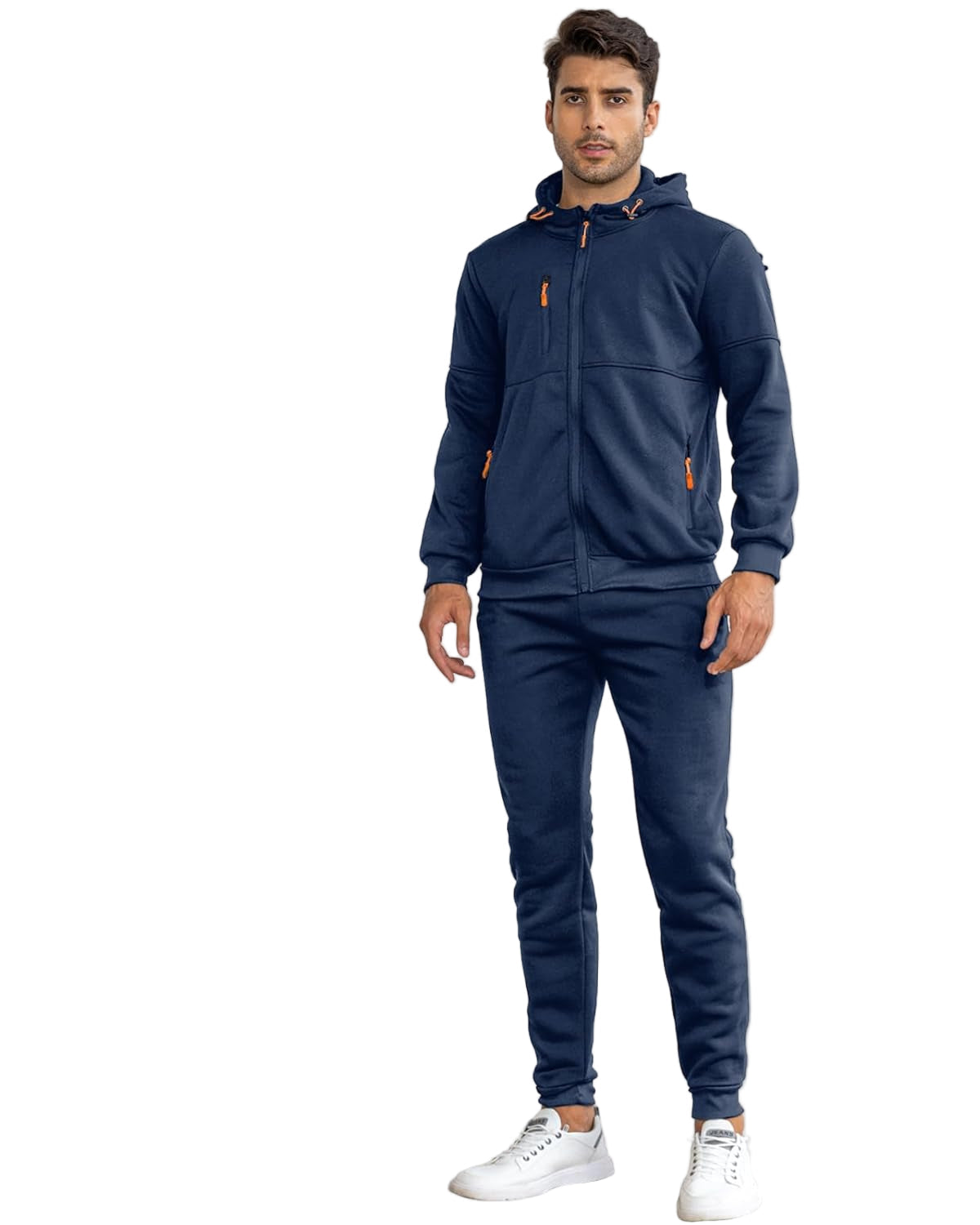 Man wearing a navy tracksuit with orange accents on a white background