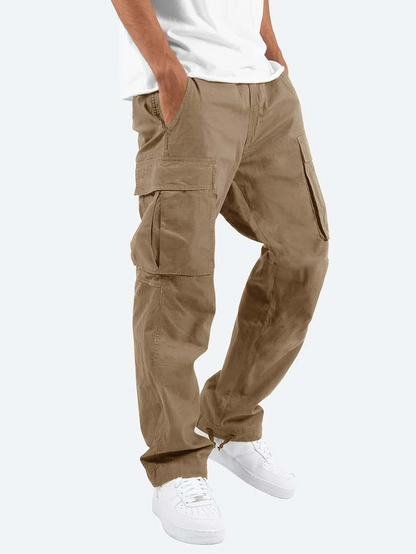 Beige cargo pants worn by a person on a white background