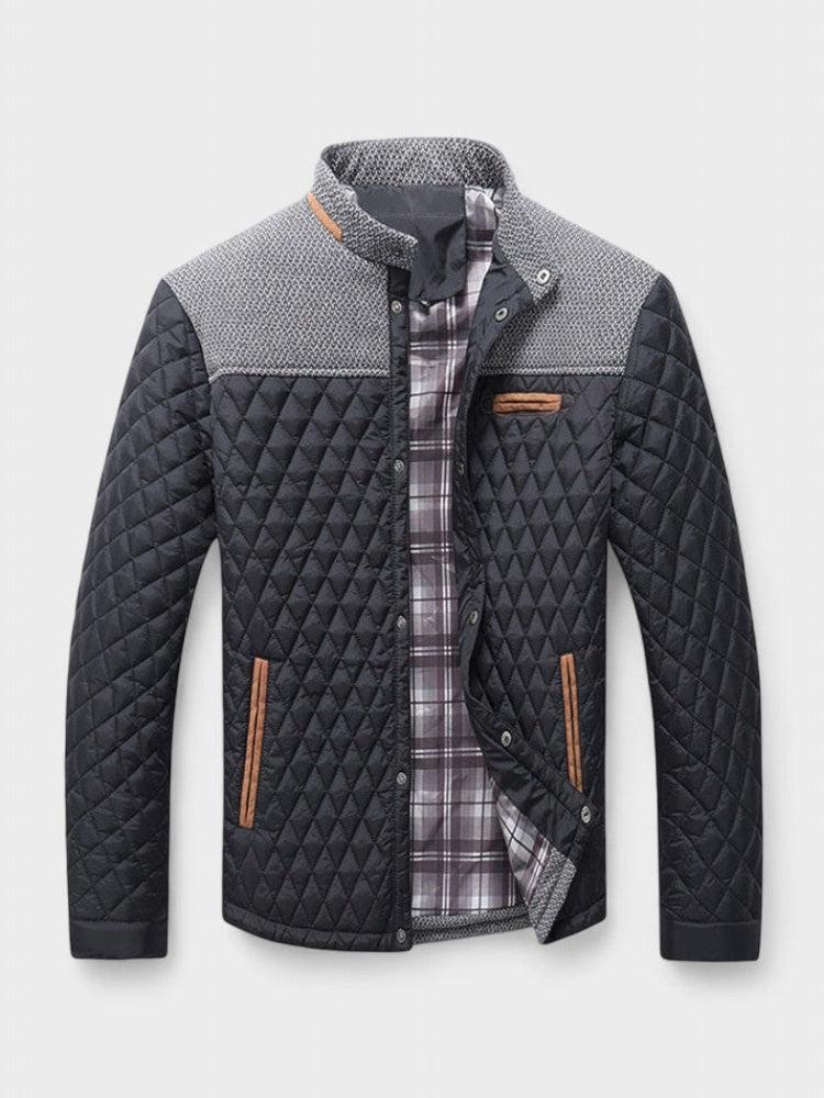 Quilted jacket with plaid lining on a light gray background