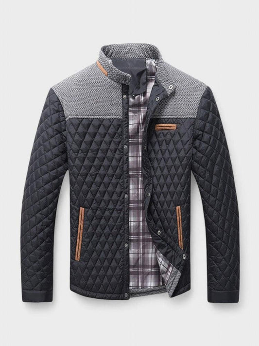 Quilted jacket with plaid lining on a light gray background