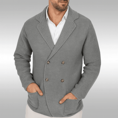 Gray textured blazer worn by a person on a light gray background