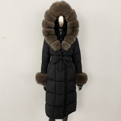 Black puffer coat with fur hood and cuffs on a white background