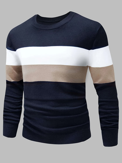 Color-blocked sweater with navy, white, and beige stripes on a gray background