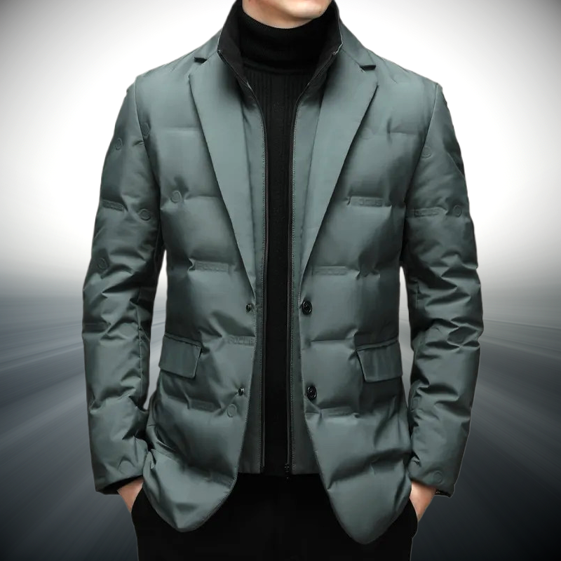 Green puffer jacket worn by a person on a gray background