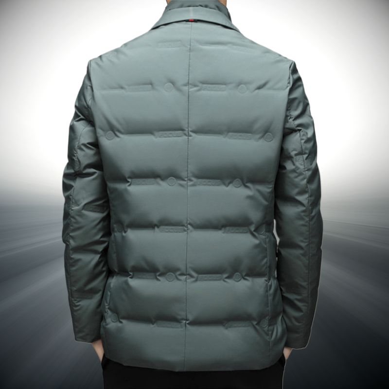 Green puffer jacket on a gray background