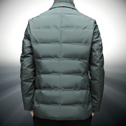 Green puffer jacket on a gray background