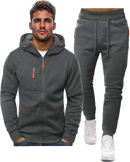 Gray hoodie and jogger pants set with orange accents worn by a man on a white background