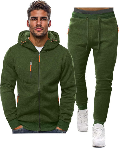 Green hoodie and jogger pants set with white sneakers on a white background