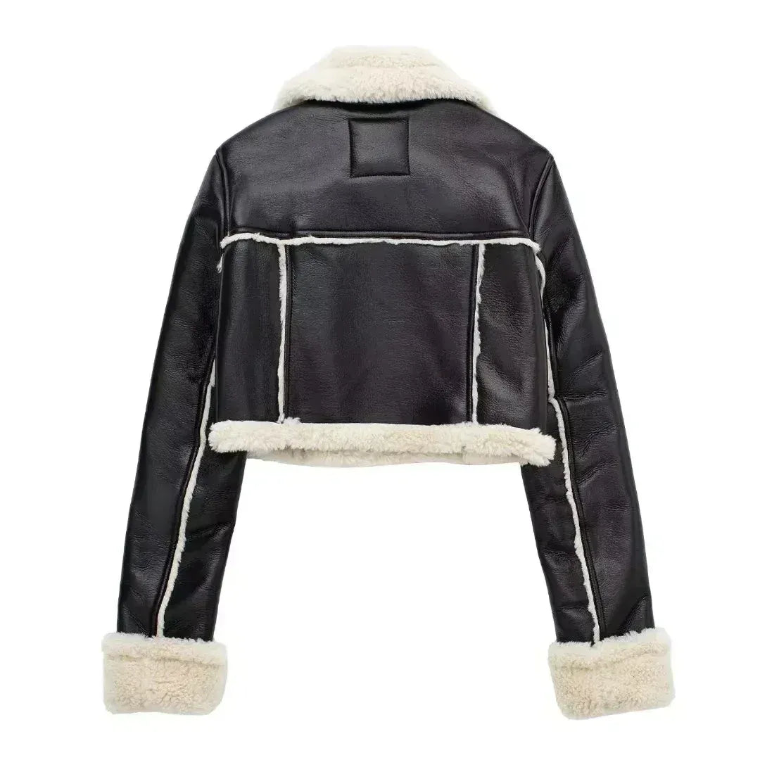Black leather jacket with white fur trim on a white background