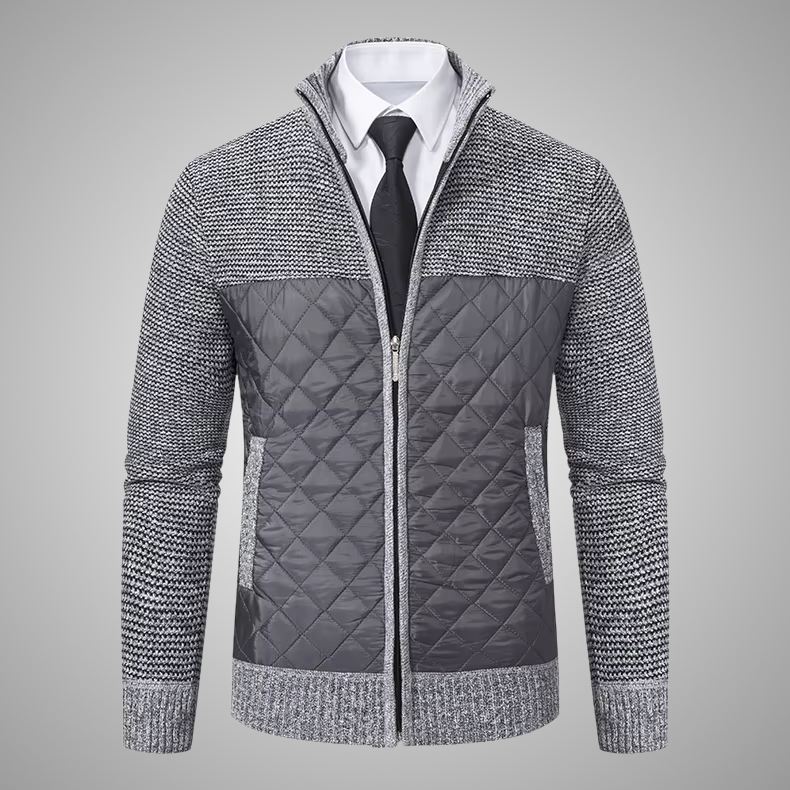 Gray quilted jacket with a zipper on a gray background