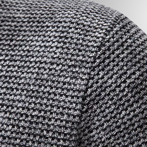 Close-up of a textured gray fabric surface