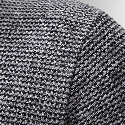 Close-up of a textured gray fabric surface