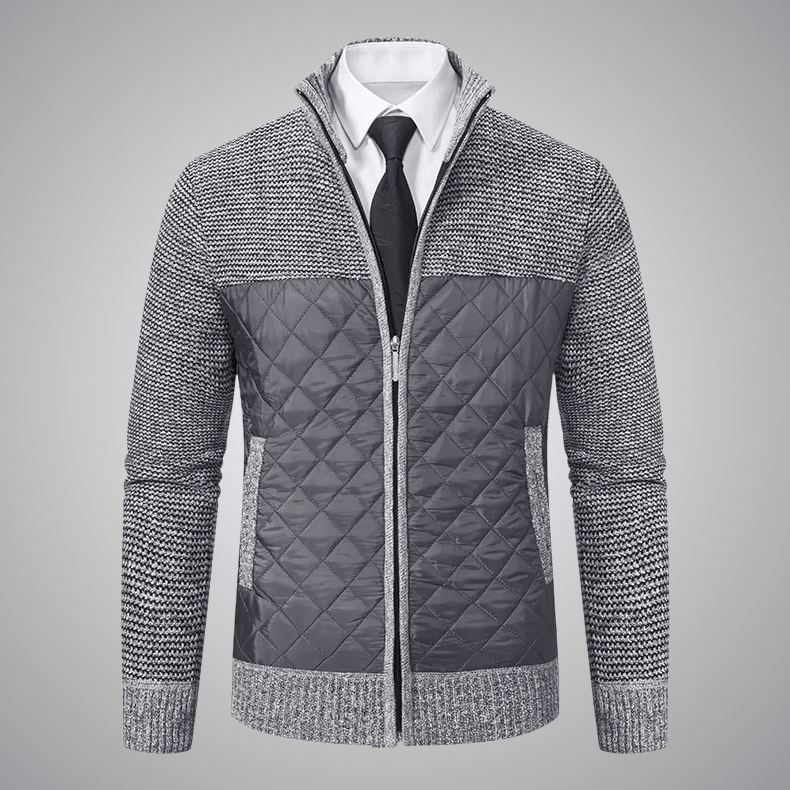Gray quilted jacket with a zipper on a gray background