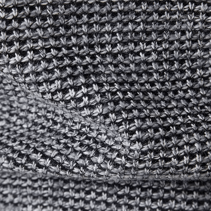 Close-up of a textured gray fabric with a subtle pattern