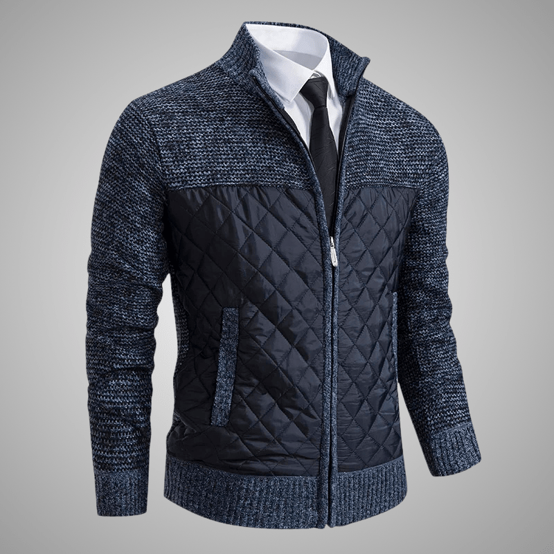 Blue quilted jacket with a white shirt and black tie on a gray background