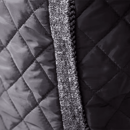 Close-up of quilted fabric with a textured stripe