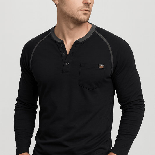 Man wearing a black long-sleeve henley shirt with gray accents on a light gray background