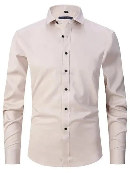 Beige dress shirt with black buttons on a white background