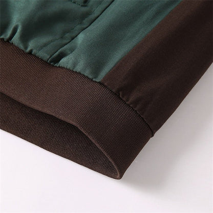 Close-up of green and brown fabric on a white background