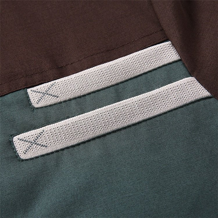 Close-up of a label on a piece of clothing with a brown and green background.