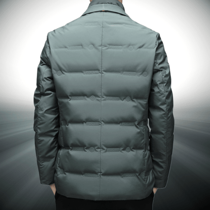 Green puffer jacket on a gray background