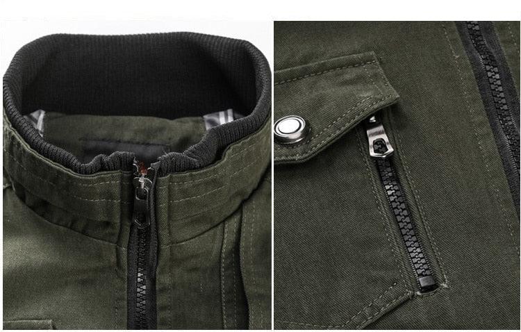 Close-up of a green jacket with zipper and button details
