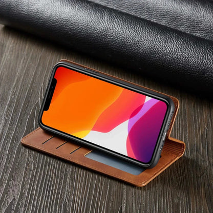 Smartphone with a colorful display inside a brown leather case on a dark wooden surface.