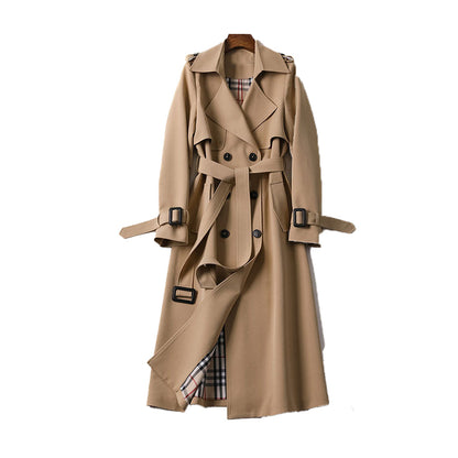 Beige trench coat with plaid lining on a white background