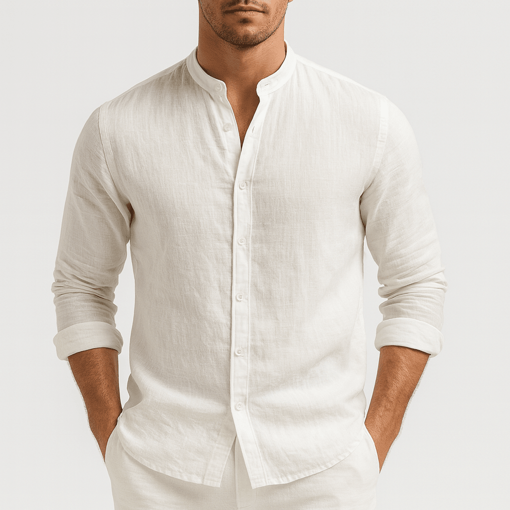 Man wearing a white linen shirt against a plain background