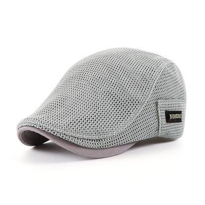 Gray mesh cap with a brand logo on a white background