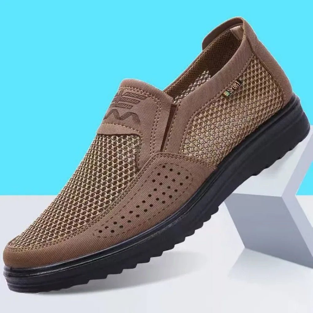 Brown mesh shoe with black sole on a light blue and white background