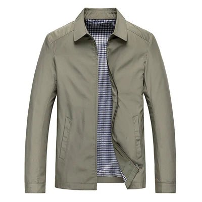 Green jacket with a checkered shirt underneath on a white background