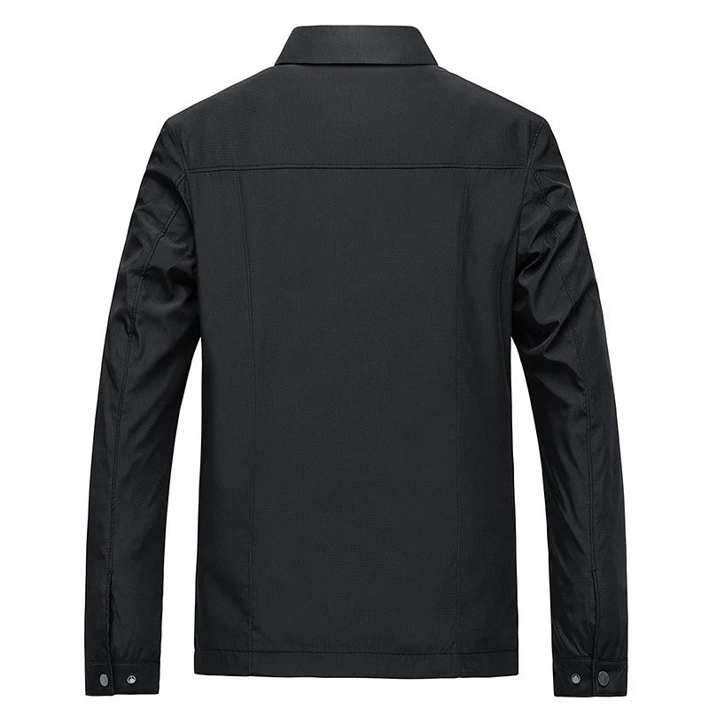 Black jacket shown from the back on a white background