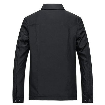 Black jacket shown from the back on a white background