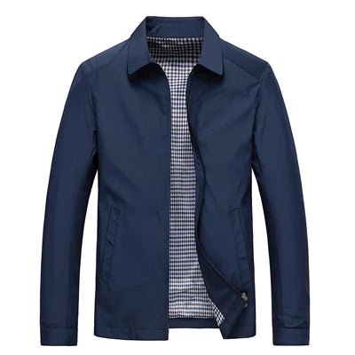 Navy blue jacket with a checkered shirt visible at the collar on a white background