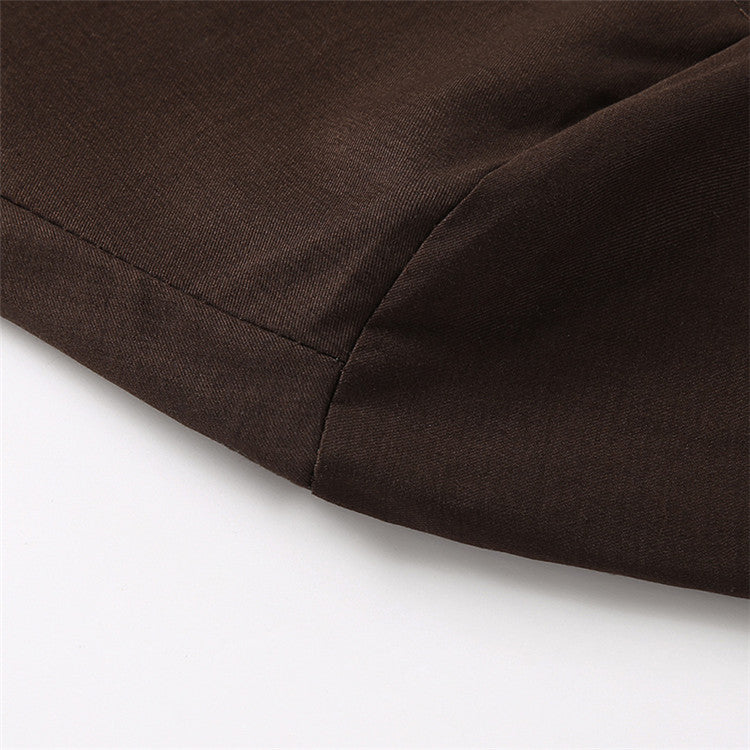 Close-up of brown fabric with a white background