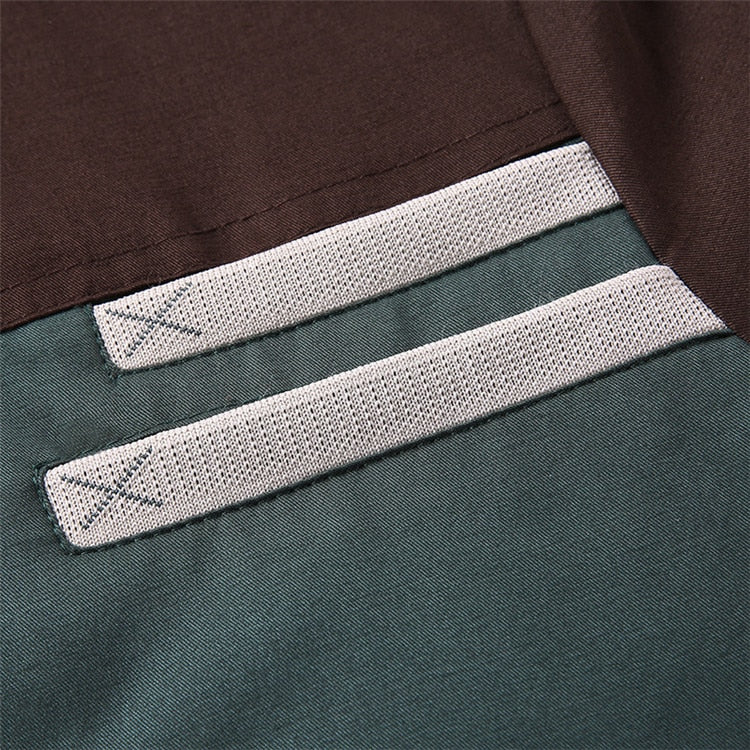 Close-up of a label on a piece of clothing with a brown and green background.