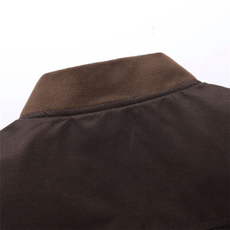 Close-up of a brown jacket with a collar on a white background