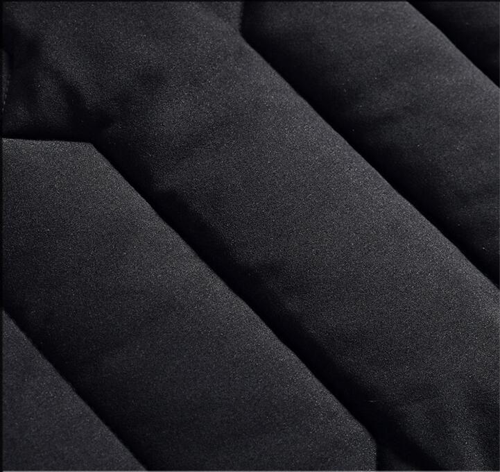 Close-up of black fabric with folds