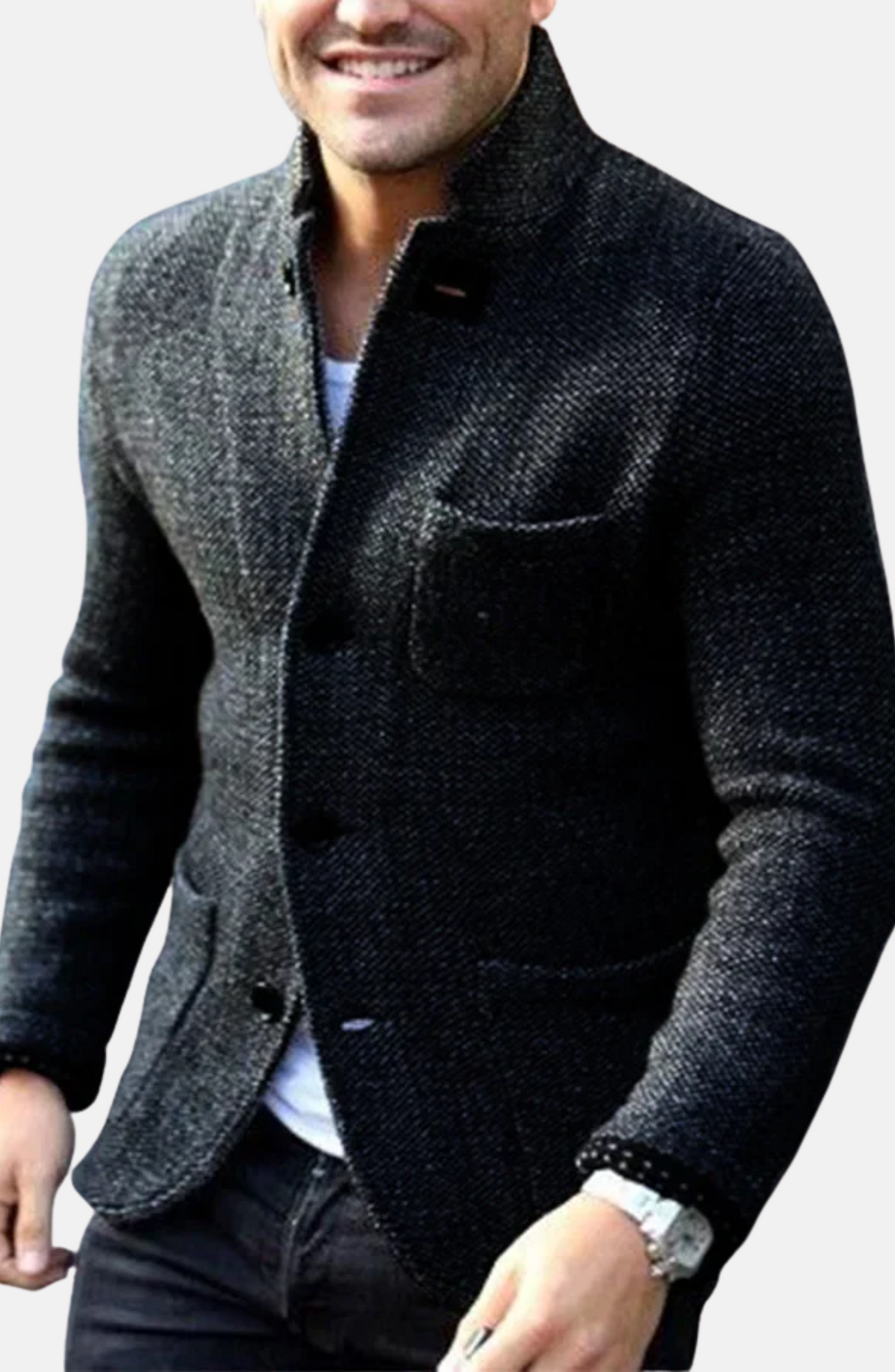 Man wearing a dark gray blazer over a white shirt on a light gray background