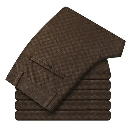 Stack of brown checkered towels on a white background