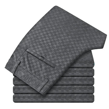 Stack of gray checkered towels on a white background