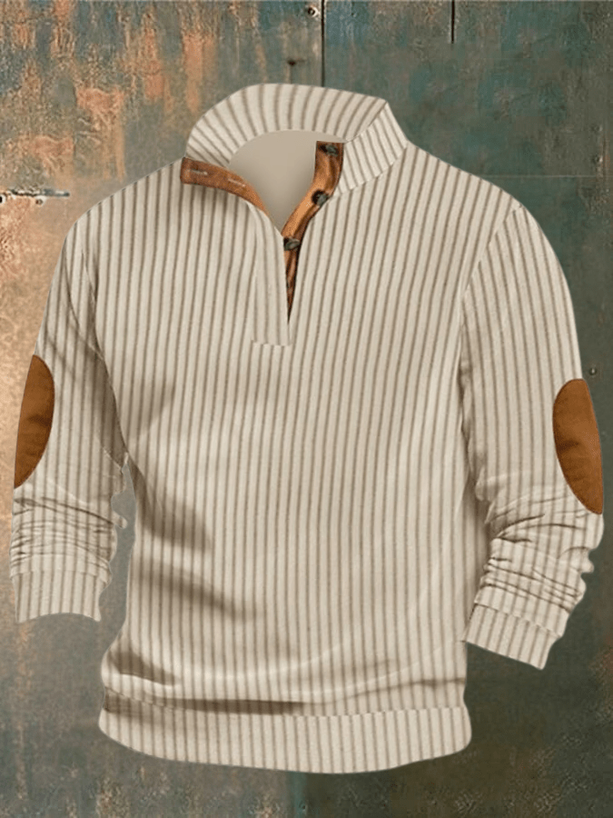 Striped sweater with elbow patches on a textured wooden background